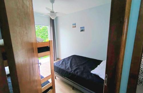 Guaratuba House | Sobrado Novo n 02 com Terraço Panorâmico e Churrasqueira - 4 min a pe ate a Praia - Condomínio Sobre as Ondas