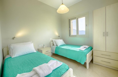 Termenades Apartment | Sofia Apartment 1 - Panoramic sea view over the entire bay of Agios Georgios Pagi