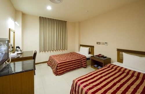Sinsing District Hotel | Song San Hotel