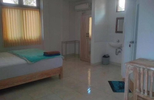 Batubulan Apartment | Soothing apartment with AC in charming Darmasaba