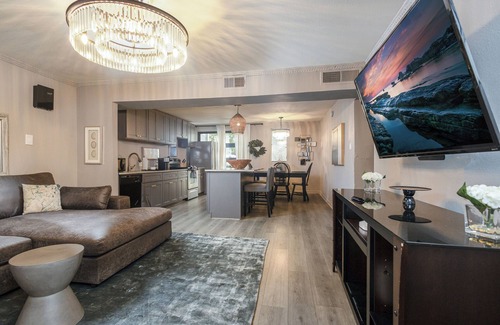 Old East Dallas Condo | Sophisticated 2-Bed, 1.5-Bath furnished condo in central Dallas with a private patio, serene garden views, and exclusive access to an award-winning courtyard equipped with premium wellness products and relaxing lounge areas.