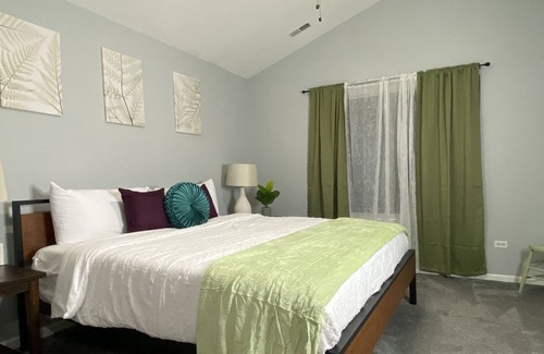 Oswego House | Sophisticated Town home w/ King Beds and Fenced Yard