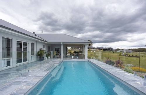 Millfield House | Soulful Grande Manor with mineral pool on private acres