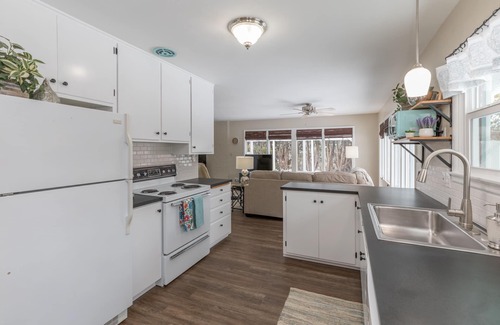 Moran Prairie House | South Hill's Blue Bungalow, A Charming Single Story Home with Lvl 2 EV Chrgr