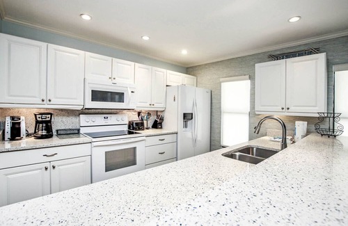 Captiva House | South Seas Beach House 15 - Direct gulf front home with pool and tennis