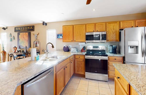 Gold Canyon House | Southwestern home with colorful patio, sparkling pool, grill & dart board
