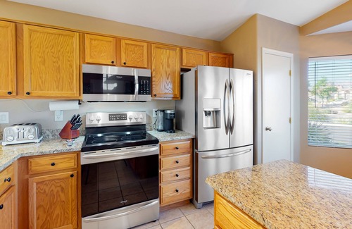 Gold Canyon House | Southwestern home with colorful patio, sparkling pool, grill & dart board