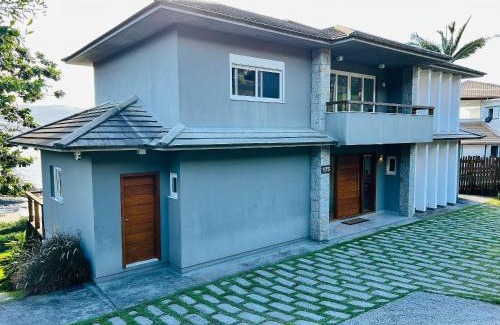 Garopaba House | Spa Jacuzzi, Lareira, Beira mar, 4 Suítes