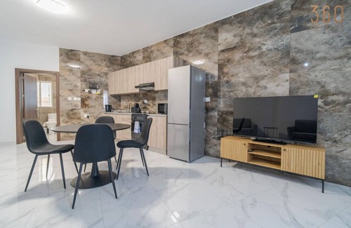 Tarxien Apartment | Spacious, 1BR home with comfortable bed in Tarxien