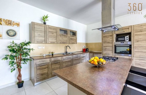 Zabbar Apartment | Spacious 3BR home with Private Terrace & WIFI