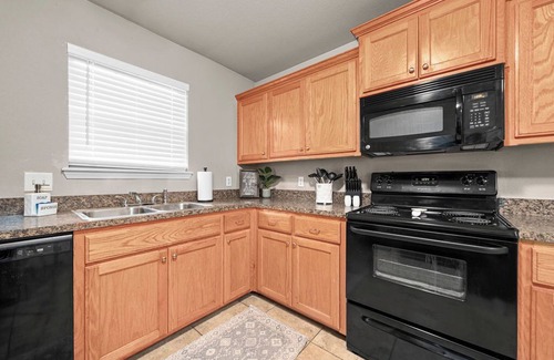 Fort Smith Apartment | “Spacious 4-Bed Home: Dual Entrances, Work-Friendly”