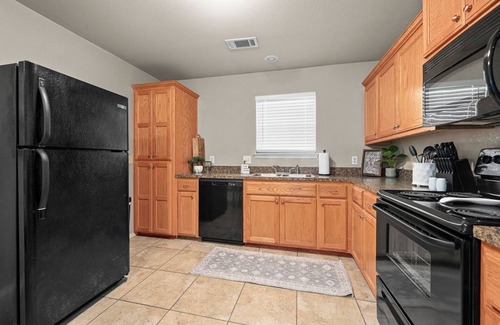 Fort Smith Apartment | “Spacious 4-Bed Home: Dual Entrances, Work-Friendly”