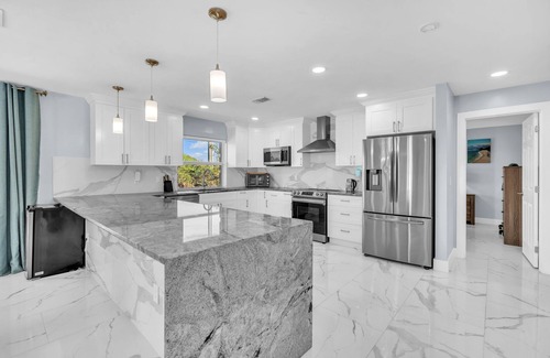 Fort Lauderdale House | Spacious 5-Bedroom Waterfront Home with Pool & Ocean Access on Dania Canal.