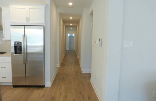 North End Condo | Spacious 5 Bedroom 4.5 Bath w/Private Elevator- 1 block from Boardwalk