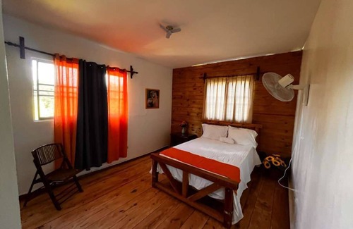 Bonao Villa | Spacious 6-bedroom villa in Tranquil Monseñor Nouel with AC