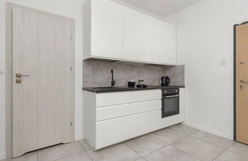 Piecki-Migowo Apartment | Spacious Apartment with Parking | Gym | Smart TV | Remote working | WiFi