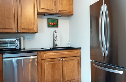 Edgerton Condo | Spacious Condo: Historic Boutique Rental in Downtown Edgerton