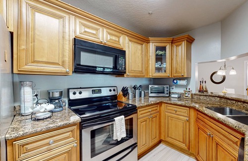 Suntree Condo | Spacious condo with private balcony, pool, W/D and WIFI