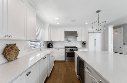 Avalon House | Spacious deck has ocean views as home is across the street from the beachblock.