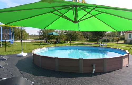 Soumeras House | Spacious, double height, beamed main space. This gite is in a rural setting.