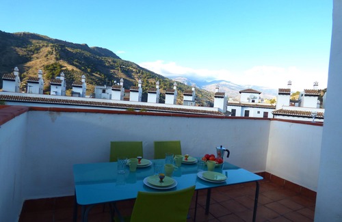 Velez de Benaudalla Apartment | Spacious duplex apt; large roof terrace boasting amazing views & shared pools