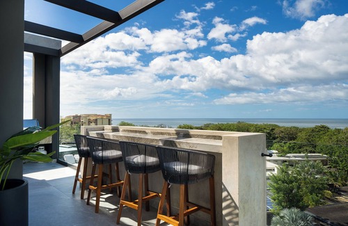 Tamarindo House | Spacious estate in enjoyable Playa Langosta with AC, fitness room, WiFi