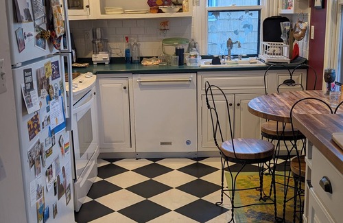 Emerson Gardens House | Spacious family 5-bedroom with yard and workspaces in historic Brookline