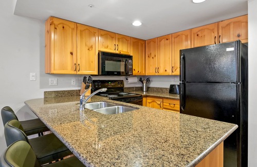 Village North Apartment | Spacious Floor Plan & Family Townhome | Village Location | Common Hot Tub