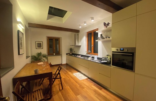 Orbetello Apartment | Spacious historic apartment with rooftop terrace