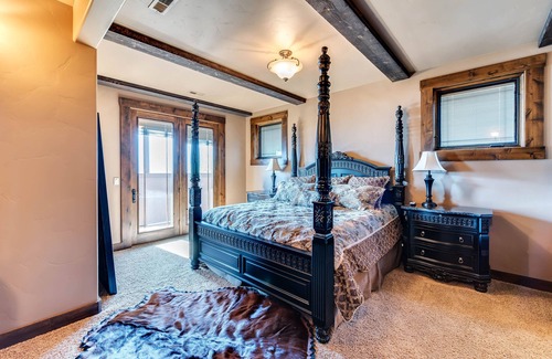 Tamarack House | Spacious lakefront home with private docks, beach, modern perks