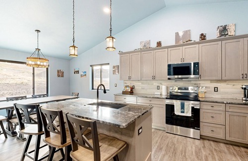 Sturgis House | Spacious mountain view home with gas fireplace, game room & heated 4 car garage
