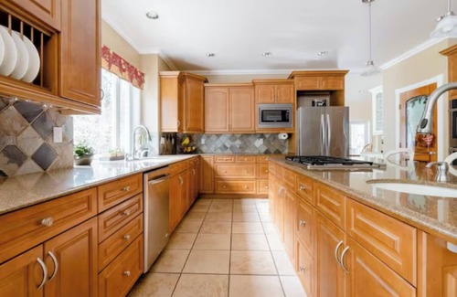 North Creek House | Spacious retreat in quiet neighborhood with fenced dog yard
