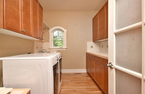 North Creek House | Spacious retreat in quiet neighborhood with fenced dog yard