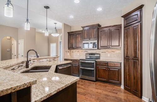 Millard House | Spacious Retreat in West Omaha 2 King 3 Queen Beds