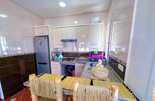 Oued Laou Apartment | Spacious terrace, pool and access to the sea.