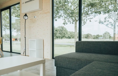 Ouddorp Cottage | Specially designed chalet with dishwasher, in a holiday park near the sea