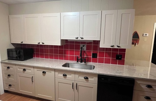 The Bays House | Spectacular newley renovated lakefront home with sandy beach and stunning views