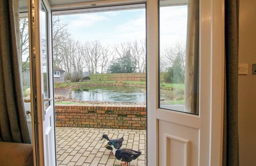 Sugnall Cottage | SPITFIRE LODGE, romantic, with hot tub in Loggerheads, Staffordshire