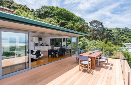 Mangawhai Heads House | Spits End - Large, modern holiday home with stunning views a short walk to estuary surf beach