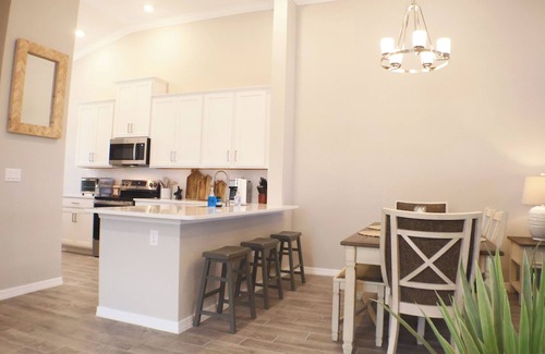 Biggar Condo | Spoil yourself at Esplanade Lake Club, luxury resort style gated community.