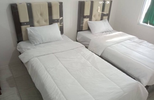 Banyuwangi Hotel | SPOT ON 92475 Rc Homestay Syariah