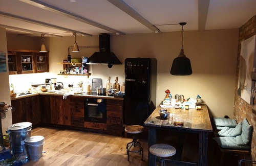 Graal Mueritz House | Stable building at the water tower with 2 vacation apartments without room walls on 2 floors