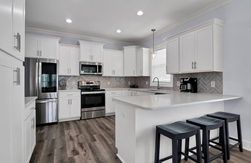North Carolina Coast House | Stay at Pier Reviewed—park once and walk to all Carolina Beach has to offer.