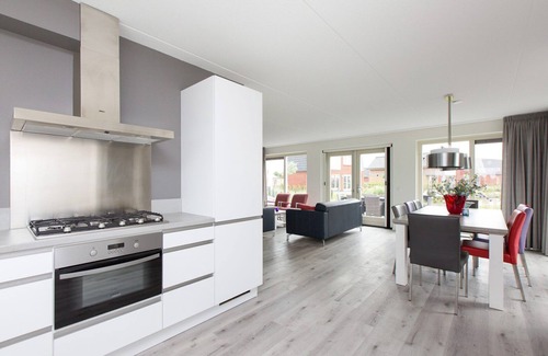 Akkrum House | Stay in our spacious Sneekermeer 8 home with private jetty.