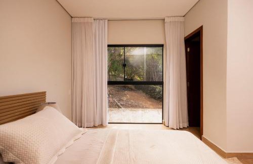 Carmo de Minas Apartment | @Stay22 -Ypê Amarelo Estate/High Standard