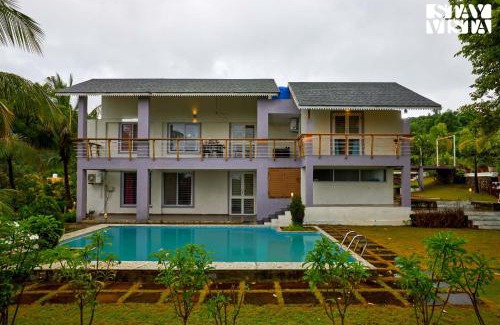 Nashik Villa | StayVista at Whispers of Green with Lawn and Pool