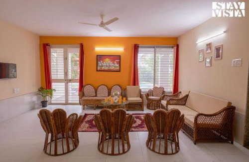 Nashik Villa | StayVista at Whispers of Green with Lawn and Pool