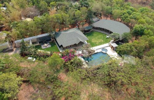 Igatpuri Villa | StayVista's Lush Villa - Rustic-Meets-Modern Interiors, Pool, Jacuzzi & Indoor activities