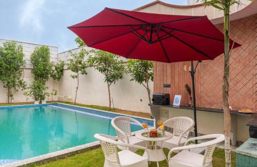 Jaipur Villa | StayVista's The Tree House - City-Center Villa with Outdoor Pool, Spacious Balconies & Vast Lawn