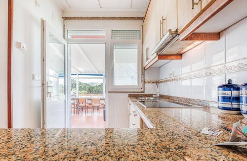 Merexo Apartment | Step into a practically equipped vacation apartment, close to picturesque stretches of coastline and